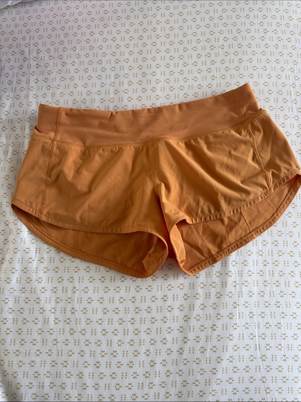 Lululemon orange running shorts